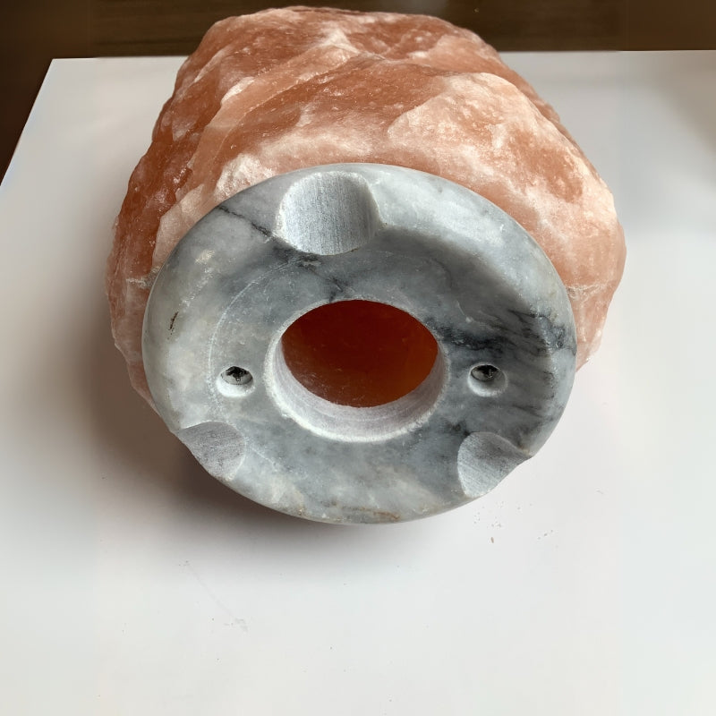 Hand-carved Himalayan salt lamp with adjustable light intensity